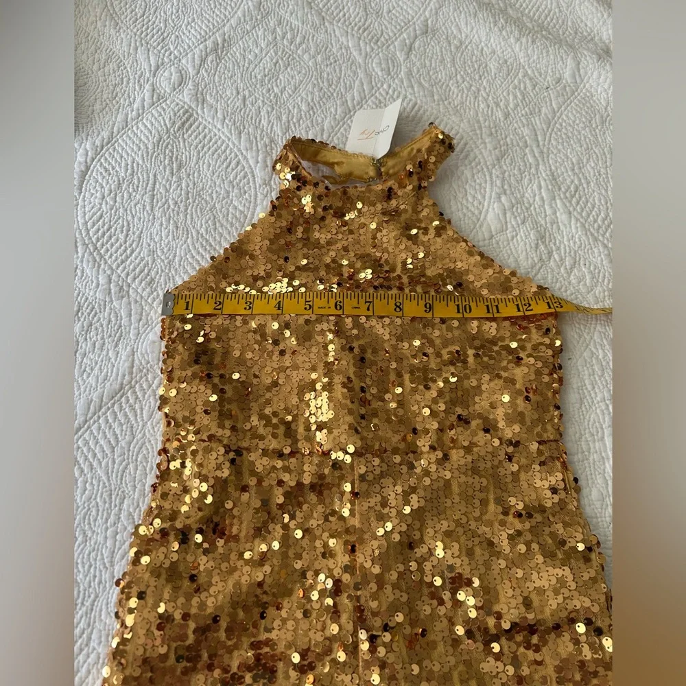 NWT Chictry Halter Neck Sequined Romper Gold Size 8. Open back/zipper. Lined